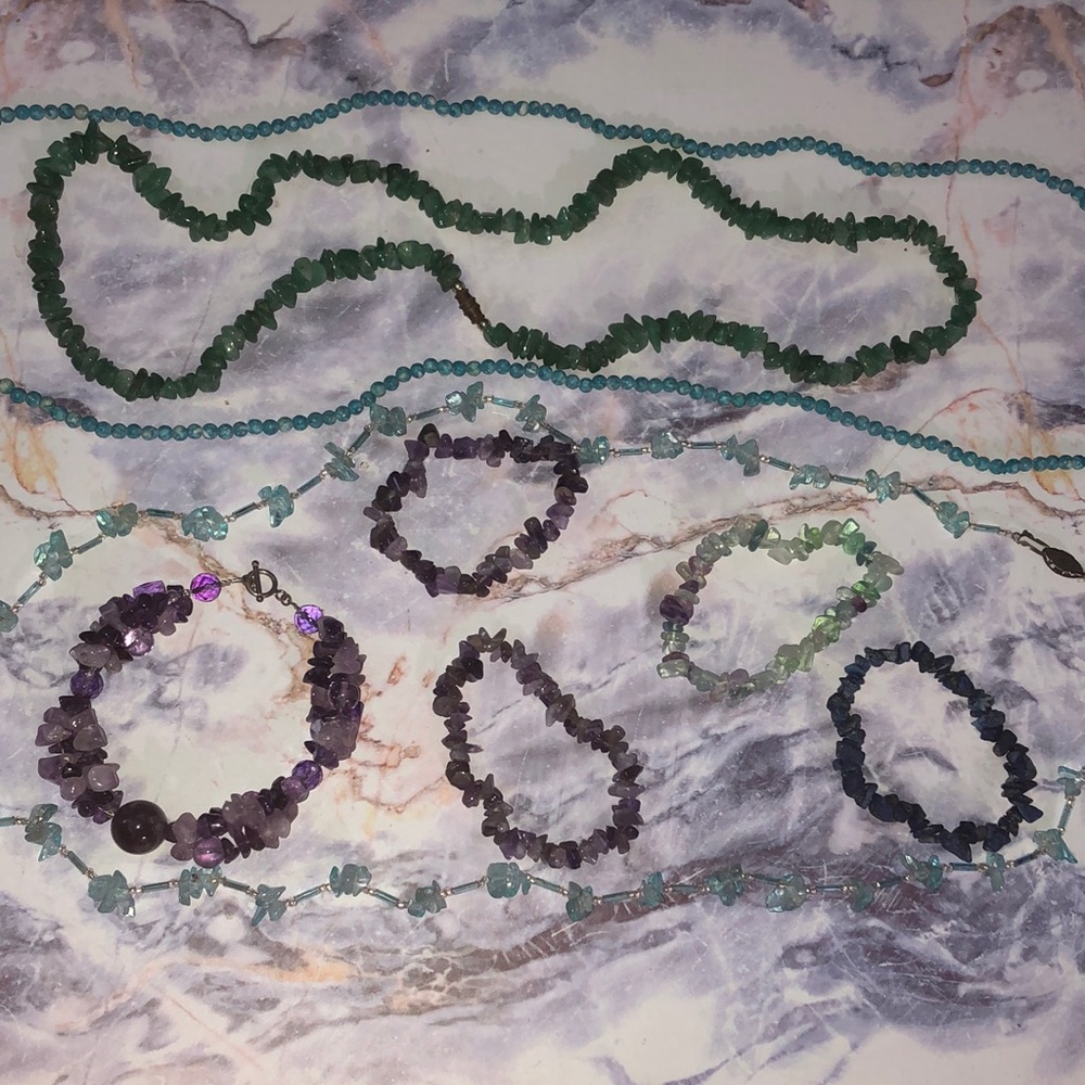5 gem stone bracelets and 3 gem stone necklaces.